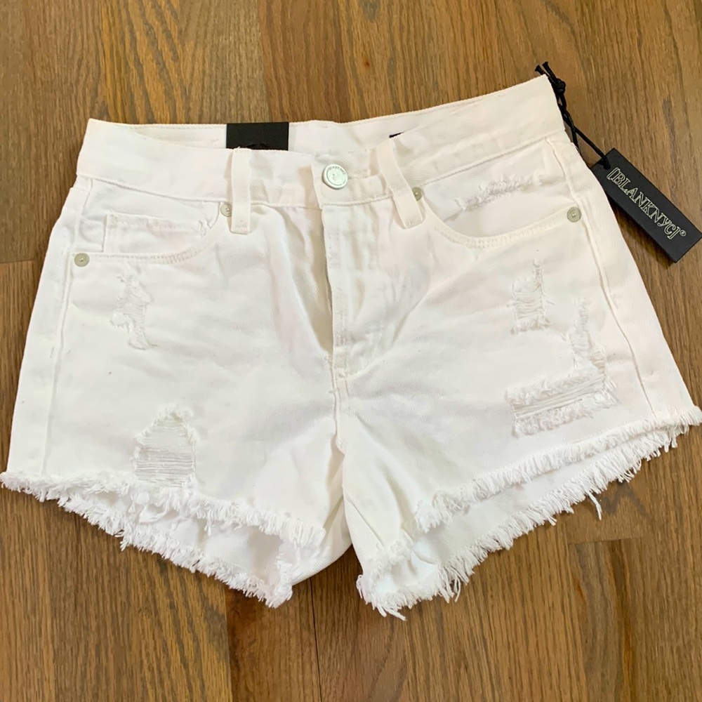 White denim shorts, fringe hem